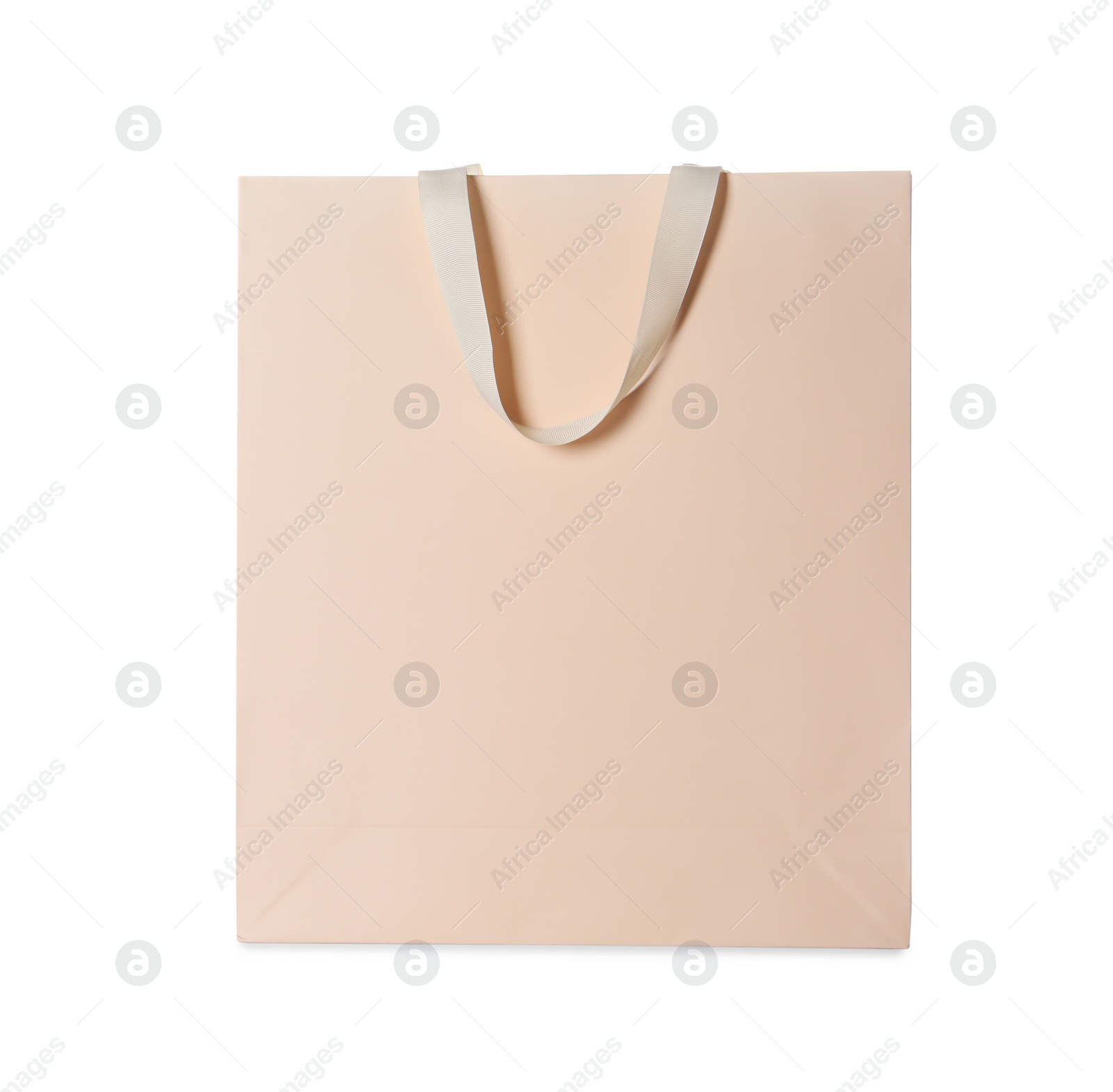 Photo of One beige shopping bag isolated on white