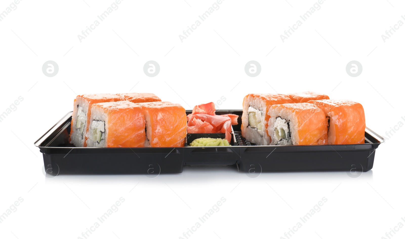 Photo of Box with tasty sushi rolls on white background. Food delivery