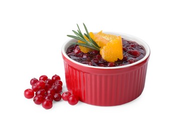 Photo of Cranberry sauce in bowl, fresh berries, rosemary and orange peel isolated on white