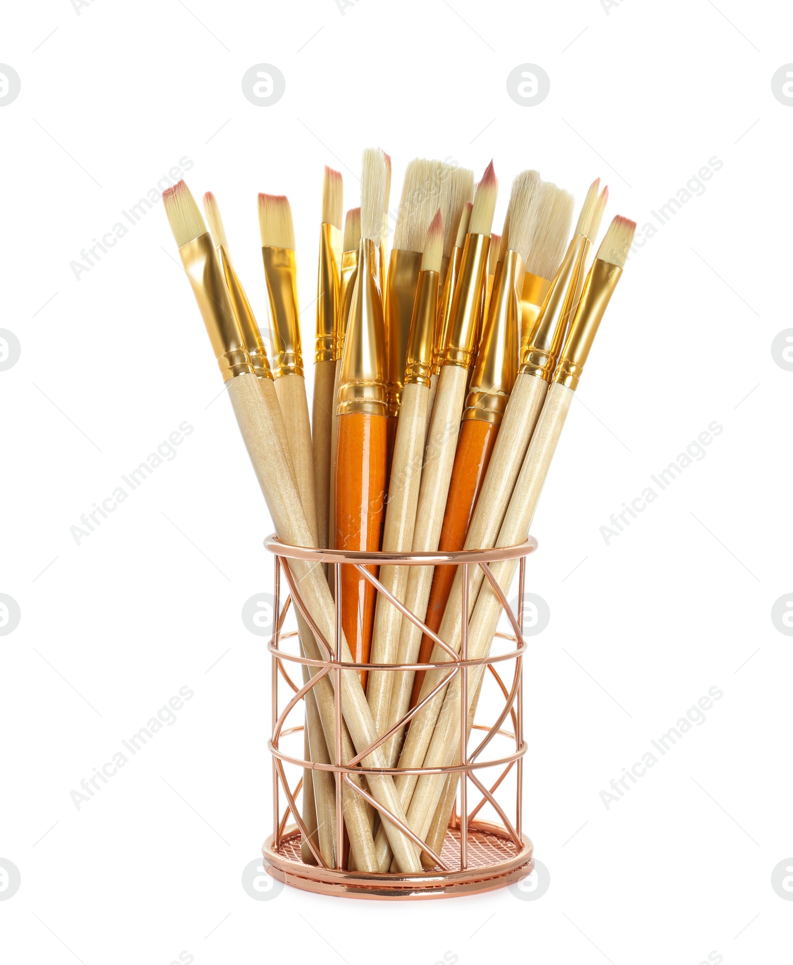 Photo of Set of paintbrushes in holder on white background