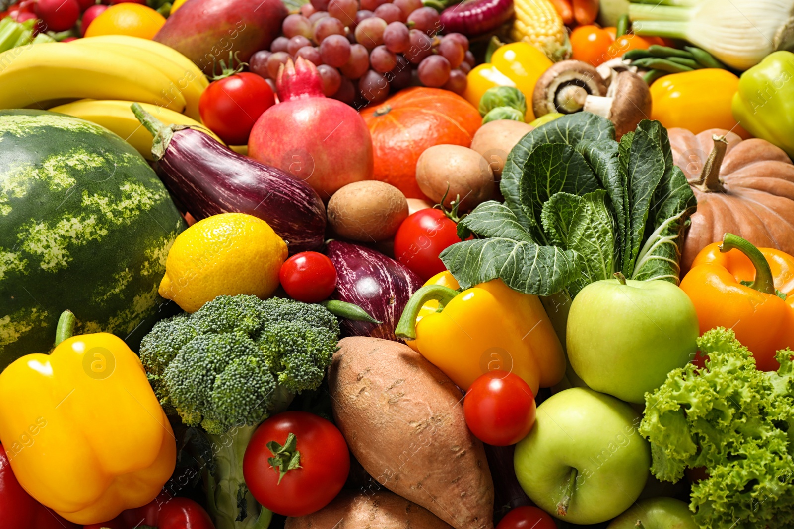 Photo of Assortment of organic fresh fruits and vegetables as background, closeup