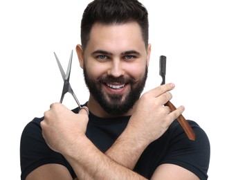 Photo of Handsome young man with mustache holding blade and scissors on white background