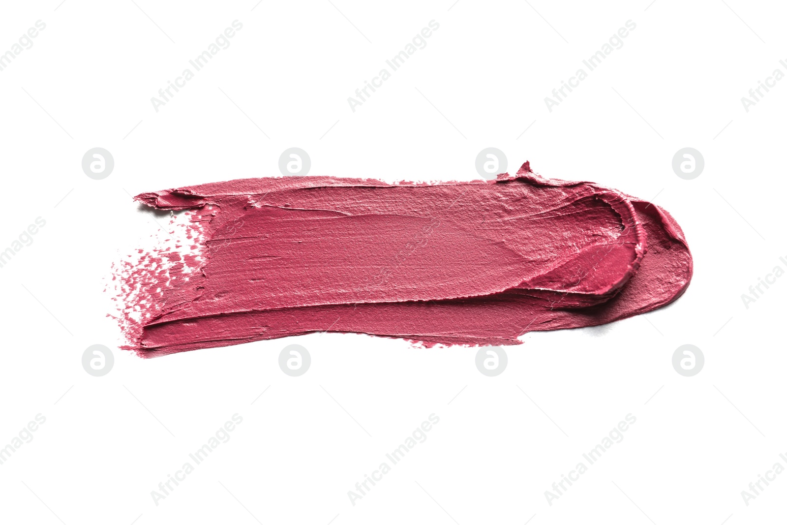 Photo of Pink lipstick smear on white background. Cosmetic product