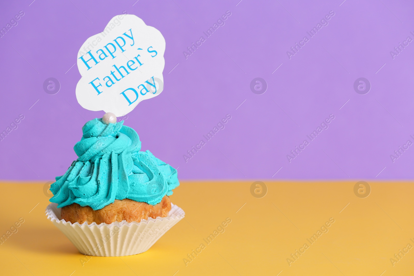 Photo of Tasty cupcake on table. Father's day celebration