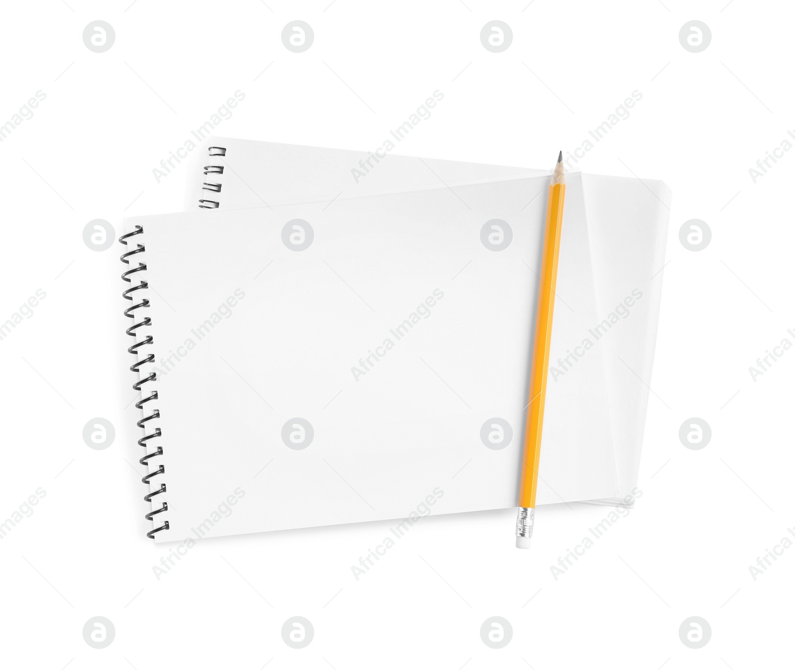 Photo of Two notebooks and pencil isolated on white, top view