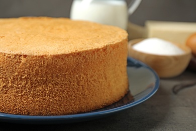 Delicious fresh homemade cake on grey marble table, closeup