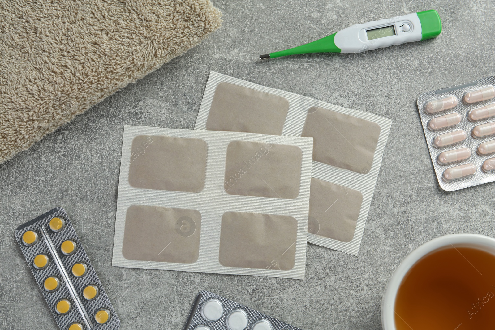 Photo of Flat lay composition with mustard plasters on light grey table