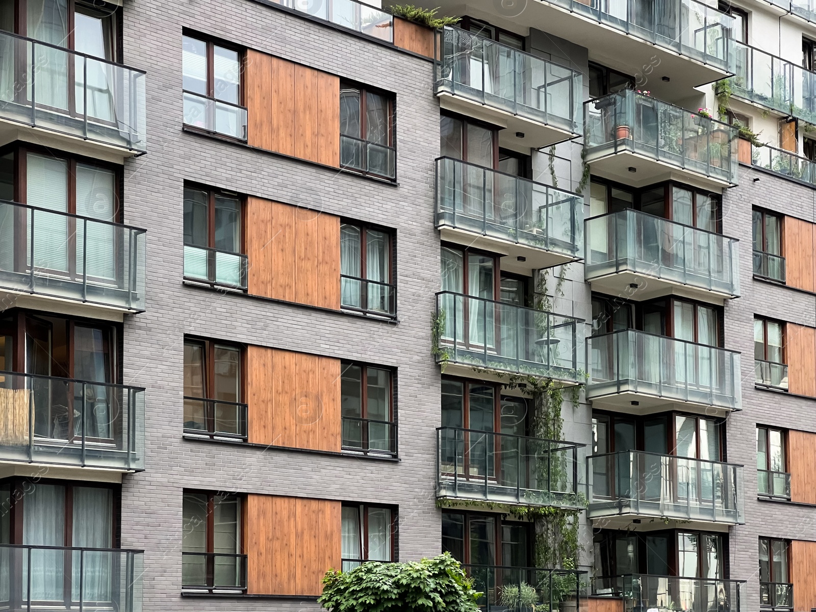 Photo of Exterior of modern residential building with balconies