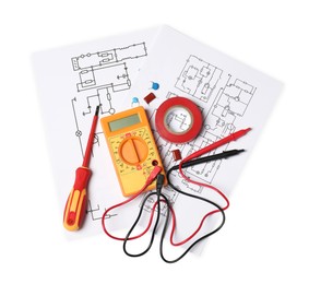 Photo of Wiring diagrams, digital multimeter and screwdriver isolated on white, top view