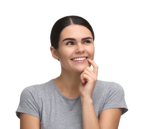 Photo of Young woman with clean teeth smiling on white background