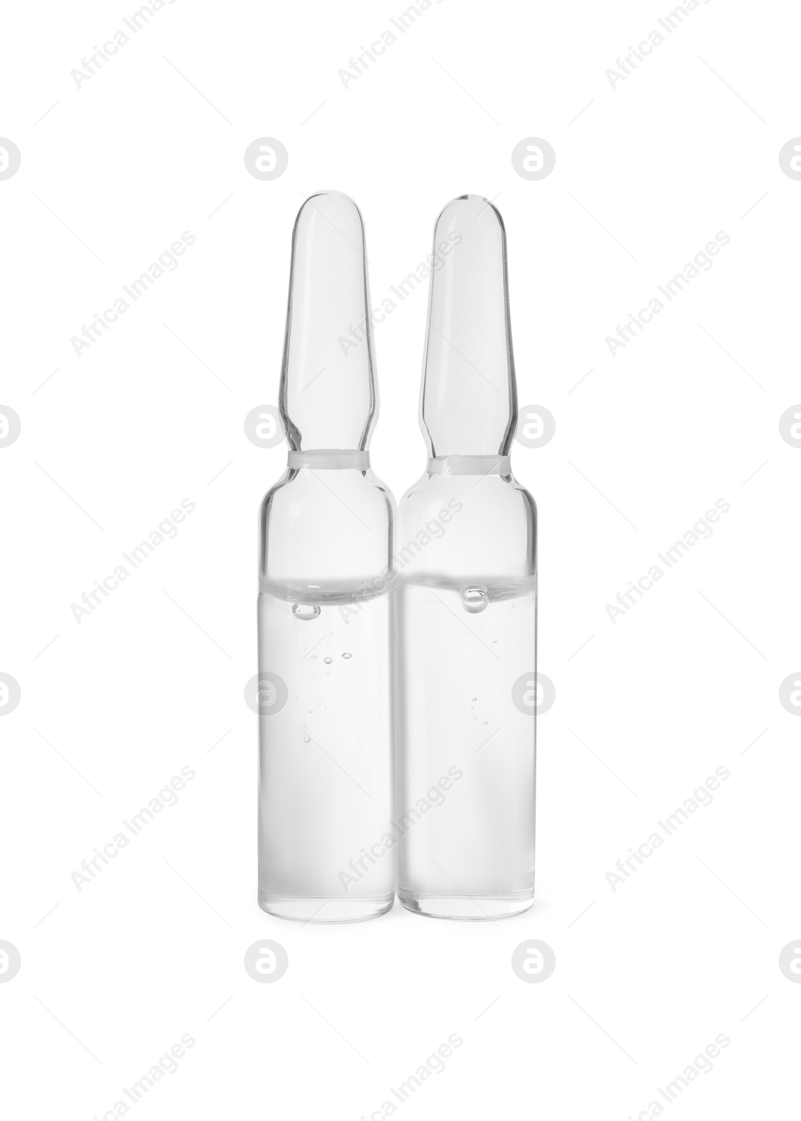 Photo of Pharmaceutical ampoules with medication on white background