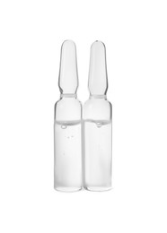Photo of Pharmaceutical ampoules with medication on white background