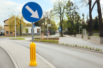 Traffic sign Keep Right on city street, space for text