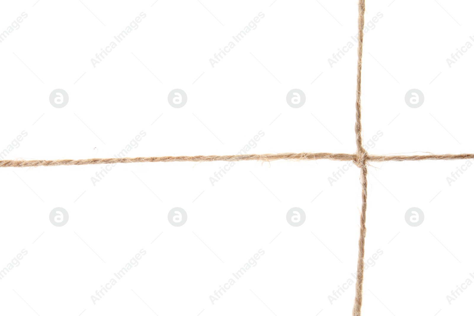 Photo of Hemp rope with knot on white background. Organic material