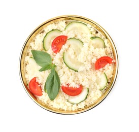 Photo of Tasty couscous with tomatoes, cucumber and basil on white background, top view