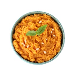 Bowl with mashed sweet potatoes on white background, top view