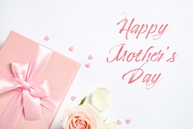Image of Happy Mother's Day. Greeting card with gift box and beautiful rose on white background, flat lay