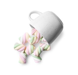 Photo of Overturned cup of delicious colorful marshmallows on white background, top view