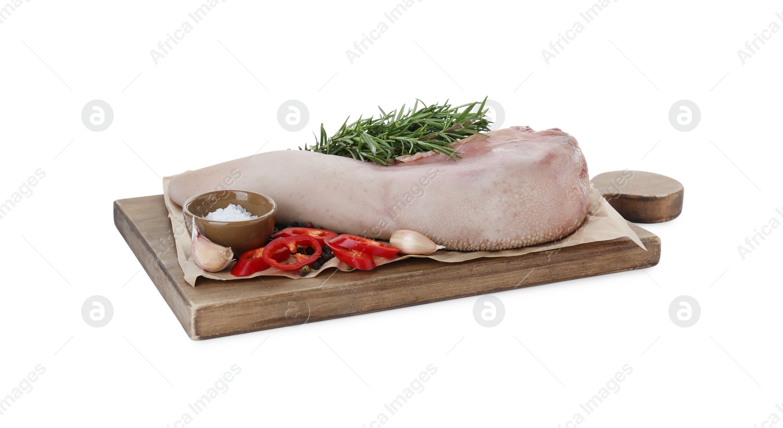 Photo of Board with raw beef tongue and products on white background