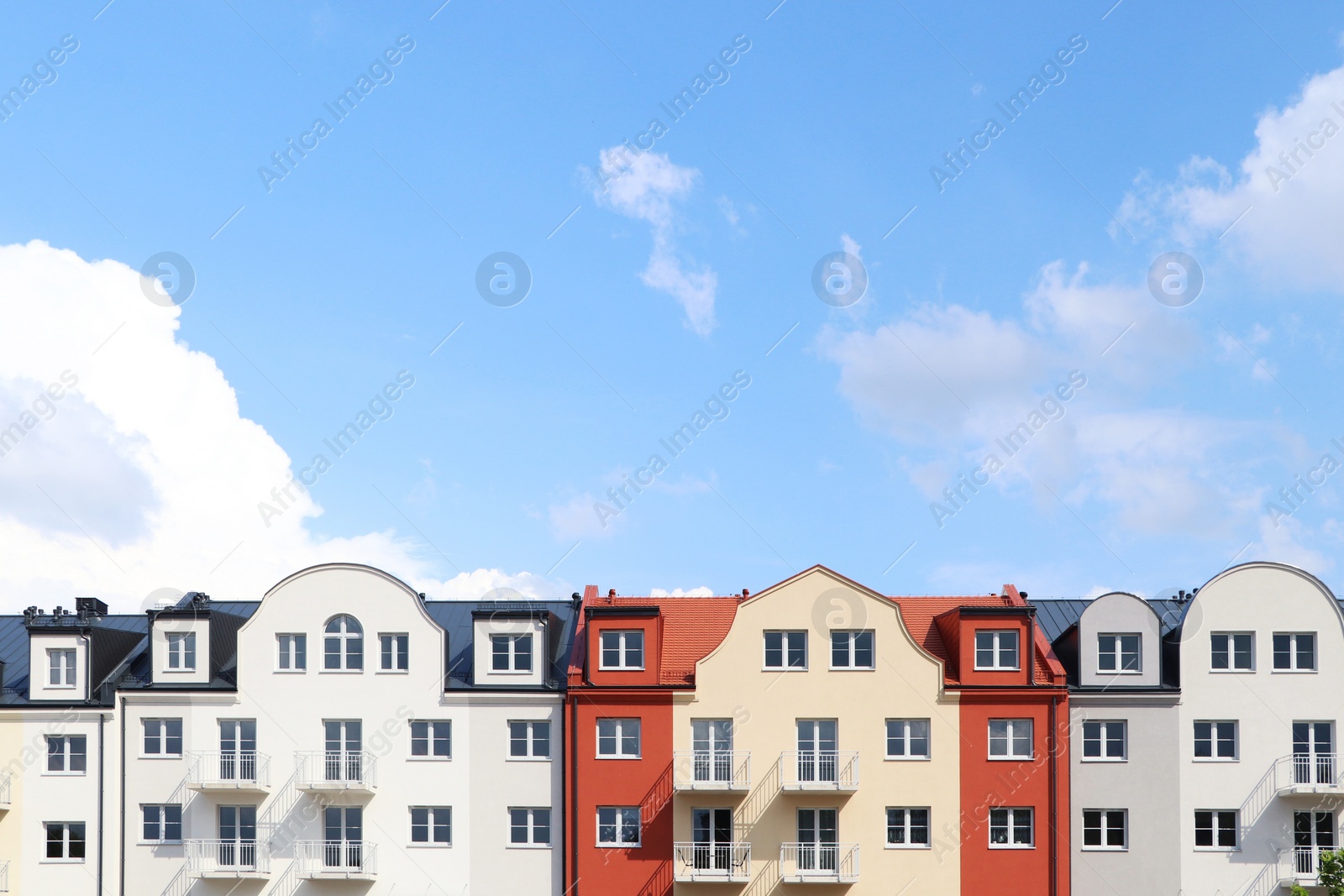 Photo of Beautiful view of modern houses against blue sky