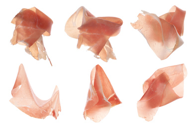 Image of Slices of tasty prosciutto on white background