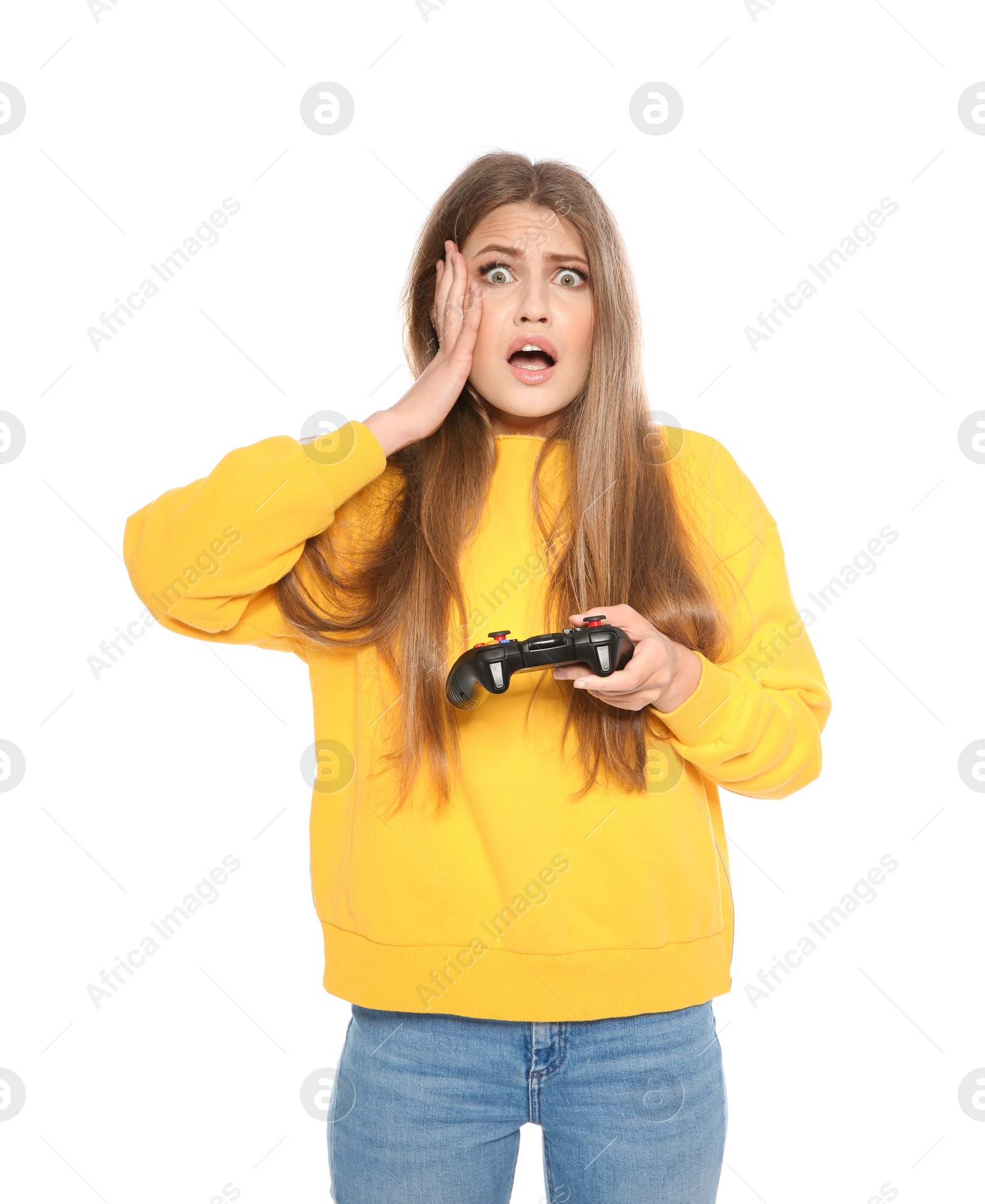 Photo of Emotional young woman playing video games with controller isolated on white