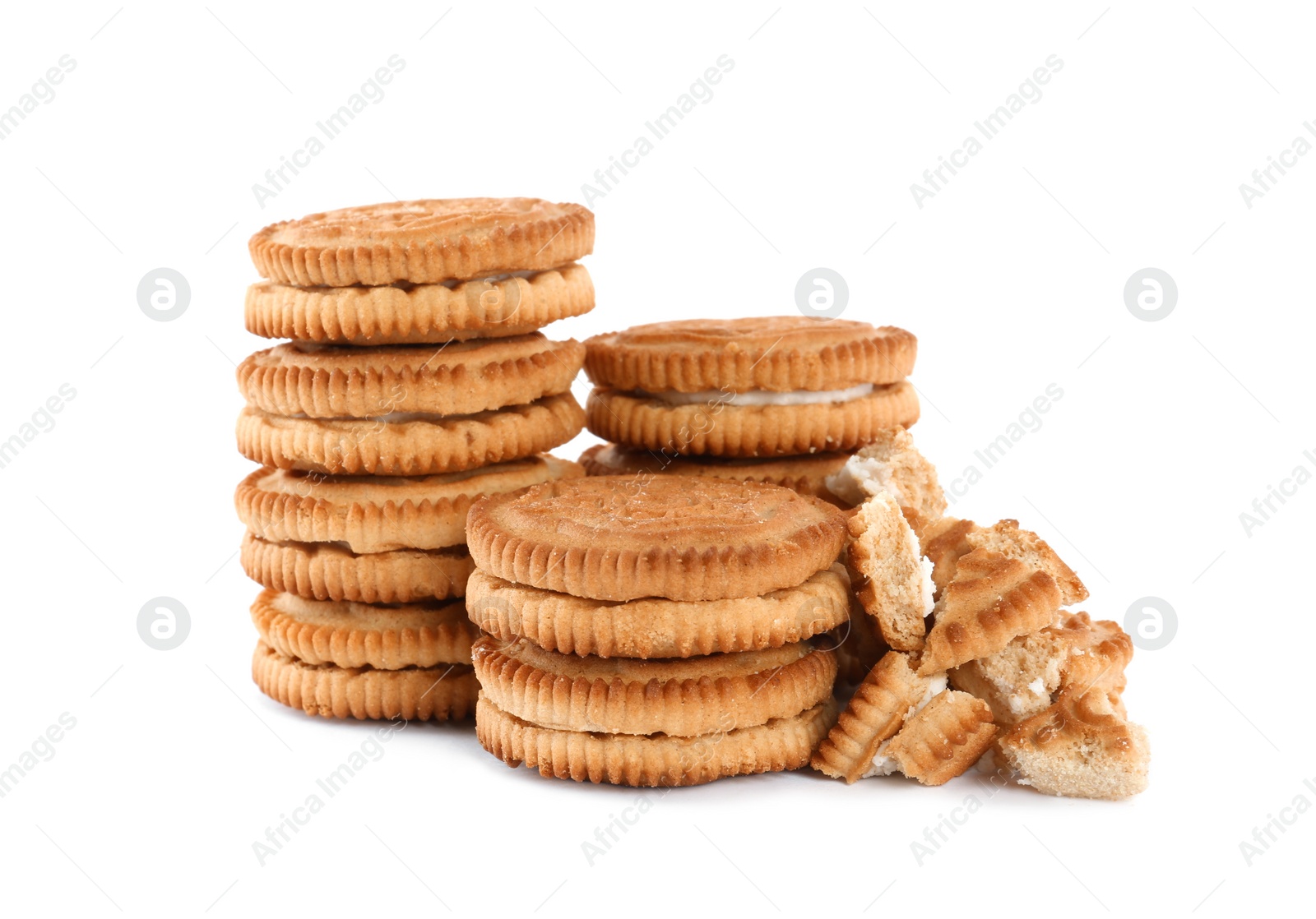 Photo of Tasty sandwich cookies with cream on white background