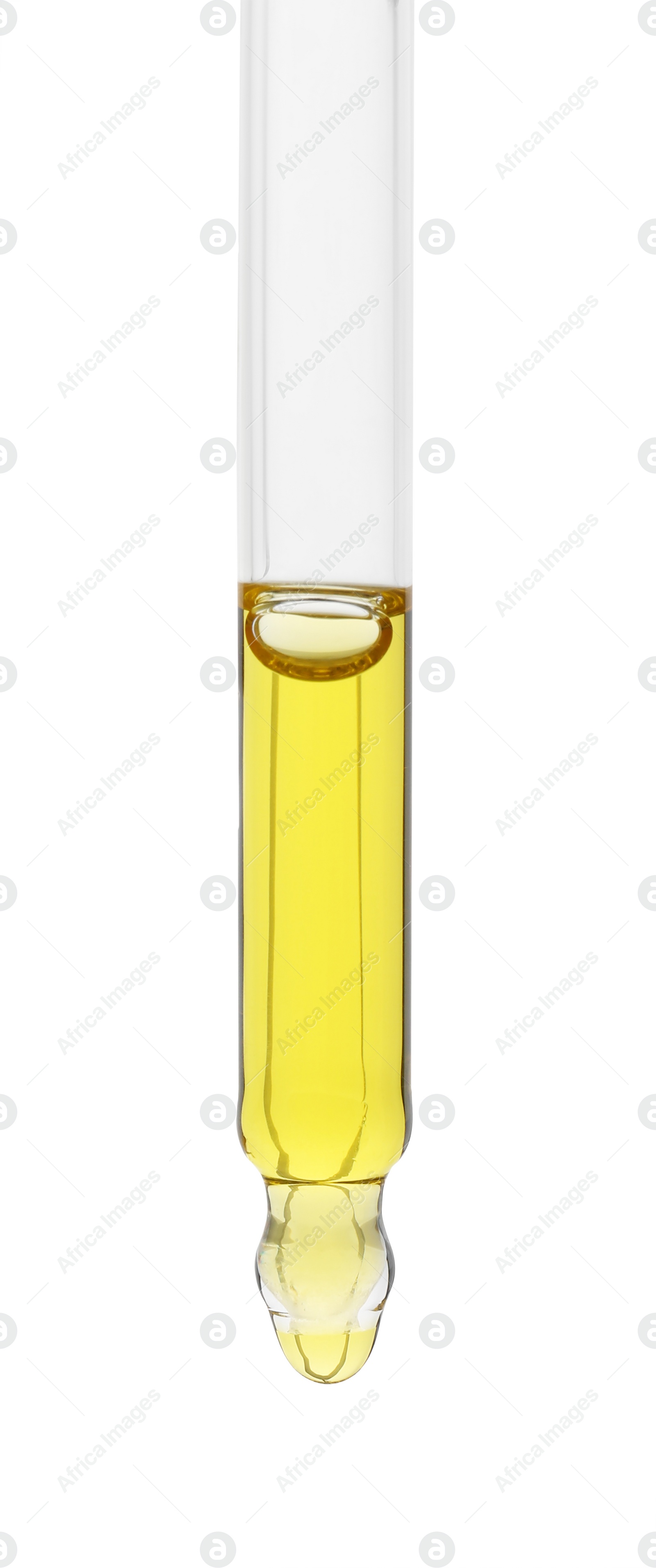 Photo of Dripping tincture from pipette isolated on white