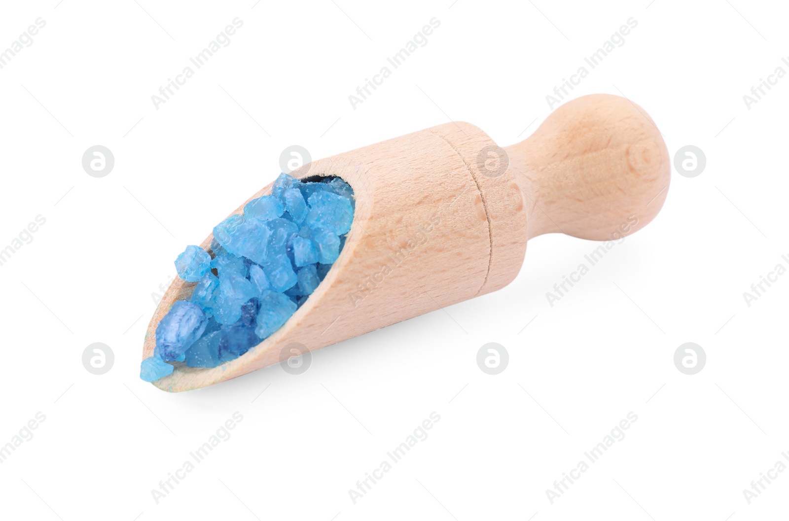 Photo of Wooden scoop with blue sea salt isolated on white