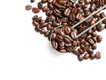 Photo of Scoop and roasted coffee beans on white background, top view