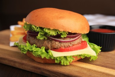 Photo of Tasty burger with vegetables, patty and cheese on table, closeup