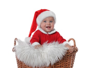 Photo of Cute baby in wicker basket on white background. Christmas celebration