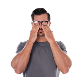 Photo of Young man with glasses covering eyes on white background
