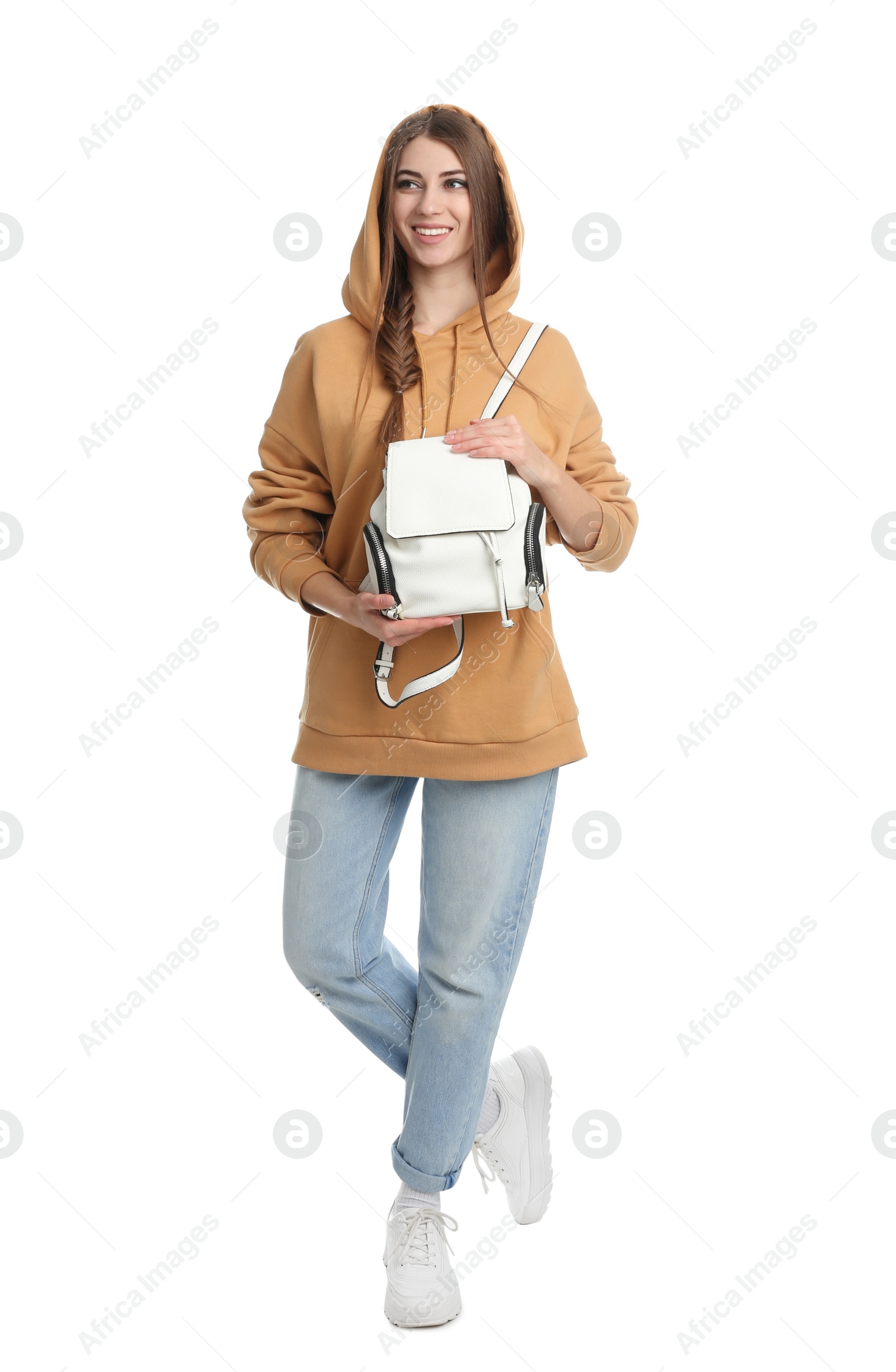 Photo of Beautiful young woman in casual outfit with stylish bag on white background