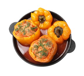 Photo of Tasty stuffed peppers and dill in pan isolated on white, top view