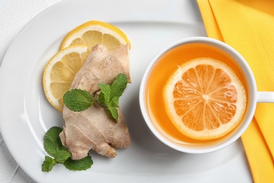 Photo of Flat lay composition with tea and therapeutic products on white background