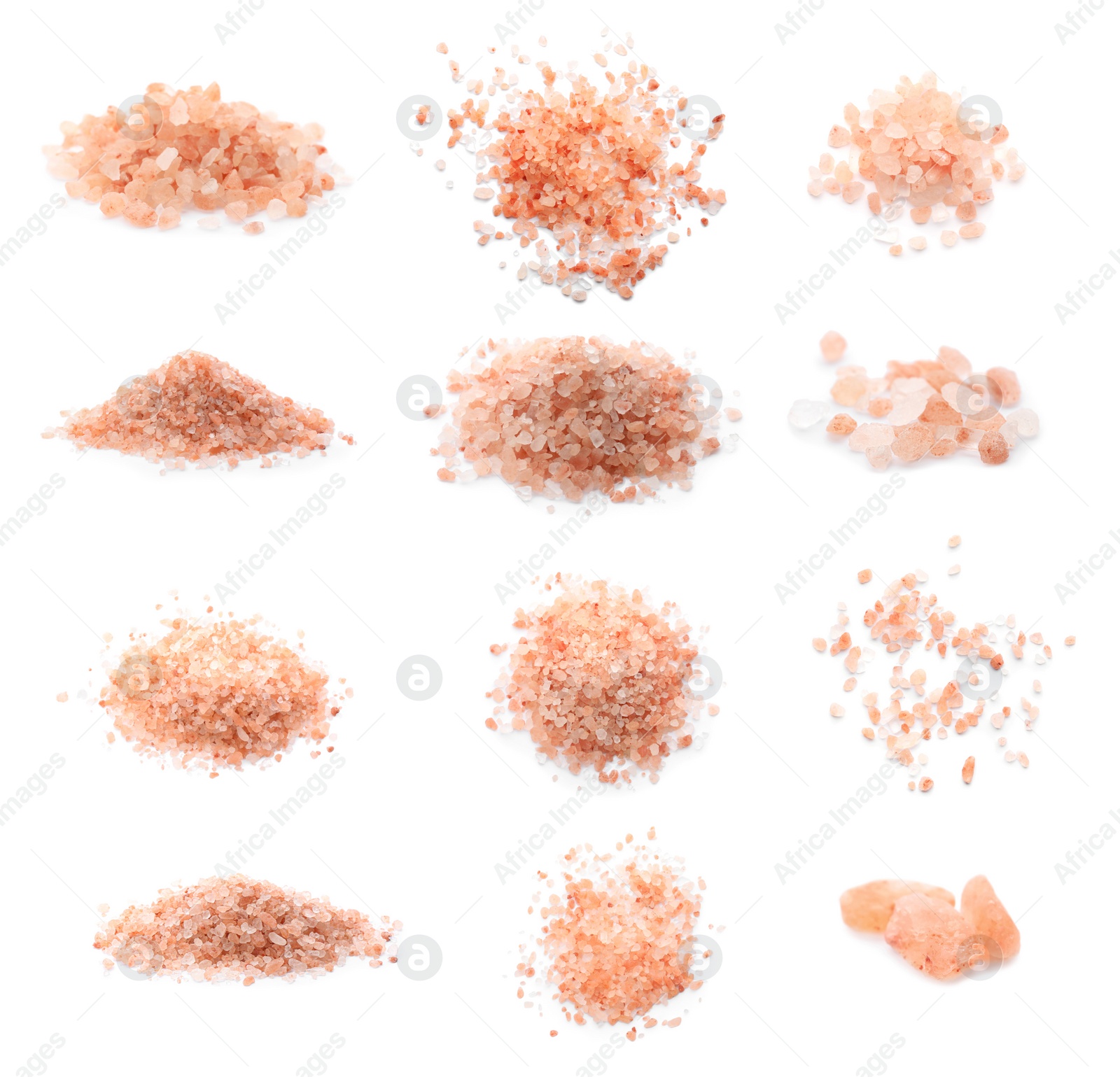 Image of Piles of pink himalayan salt on white background