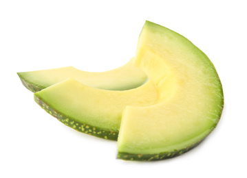 Photo of Slices of tasty ripe avocado on white background