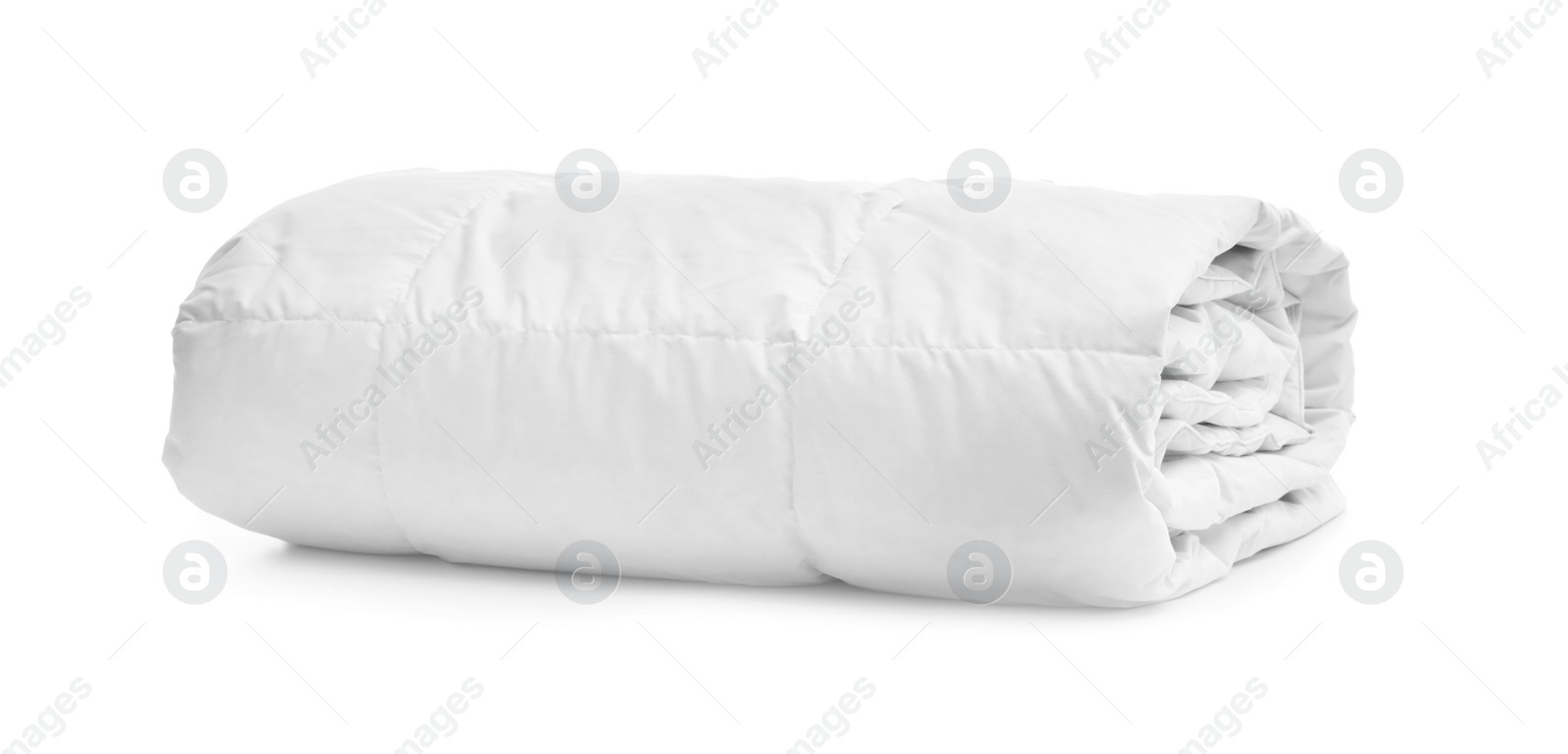 Photo of Folded soft blanket on white background. Household textile