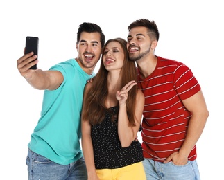 Happy young people taking selfie on white background