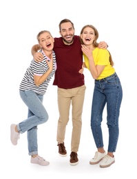 Photo of Full length portrait of young people laughing on white background