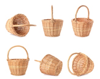 Image of Set with empty wicker baskets on white background