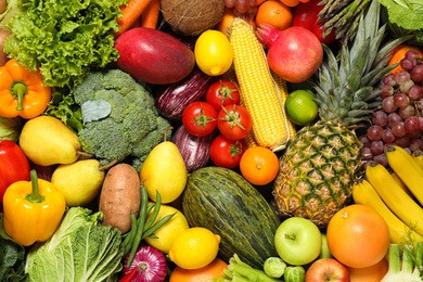 Photo of Assortmentorganic fresh fruits and vegetables as background, closeup