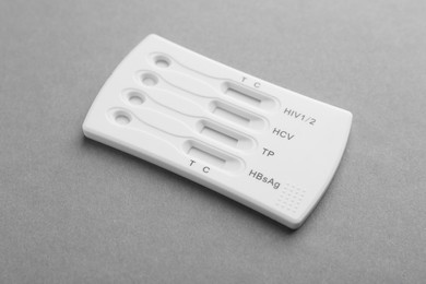 Photo of Disposable multi-infection express test on light grey background