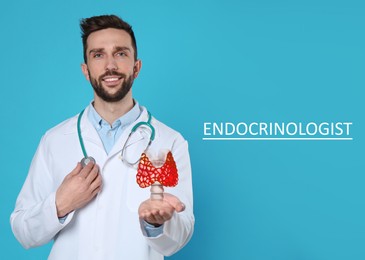 Endocrinologist holding thyroid illustration on light blue background