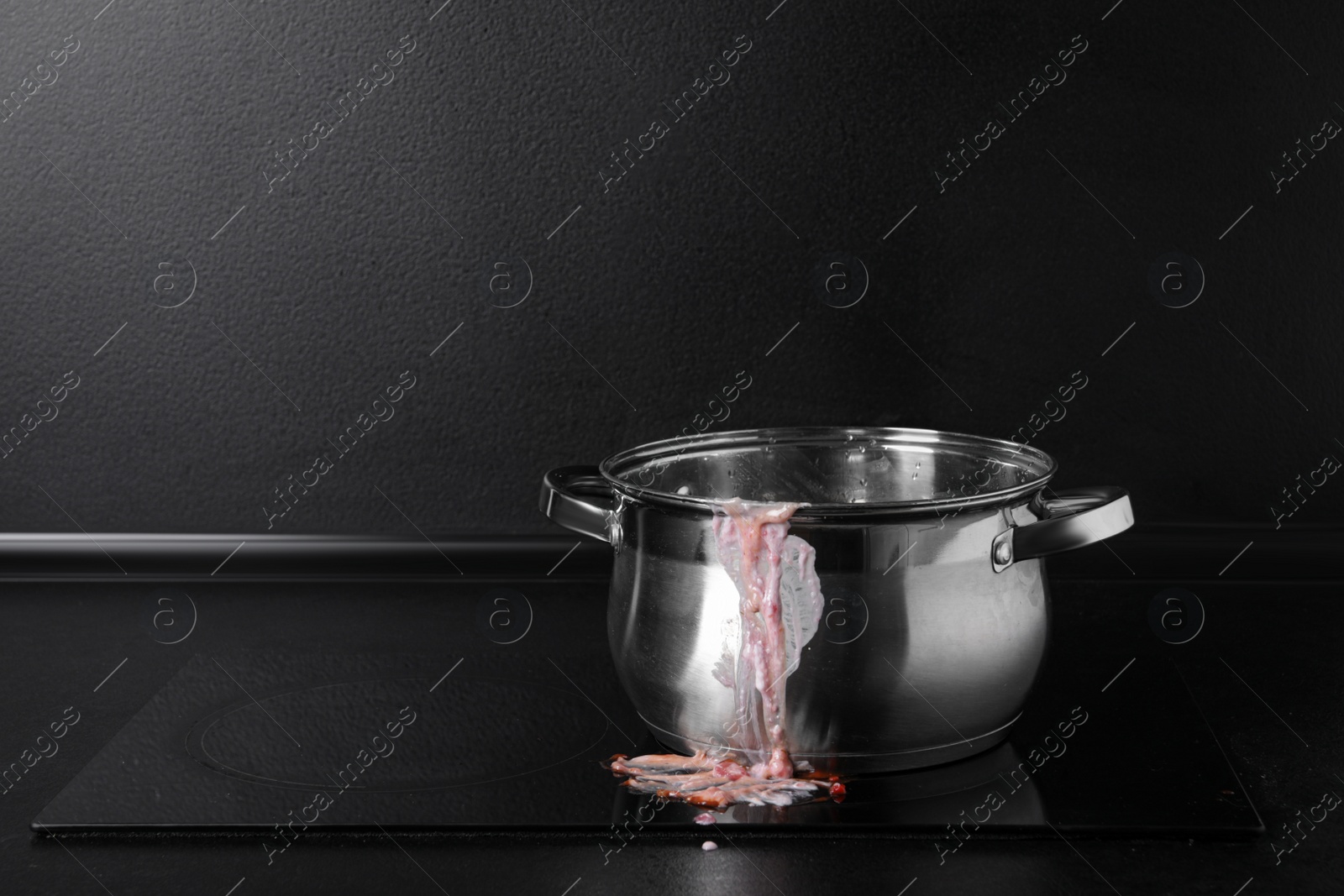 Photo of Dirty pot on cooktop in kitchen, space for text