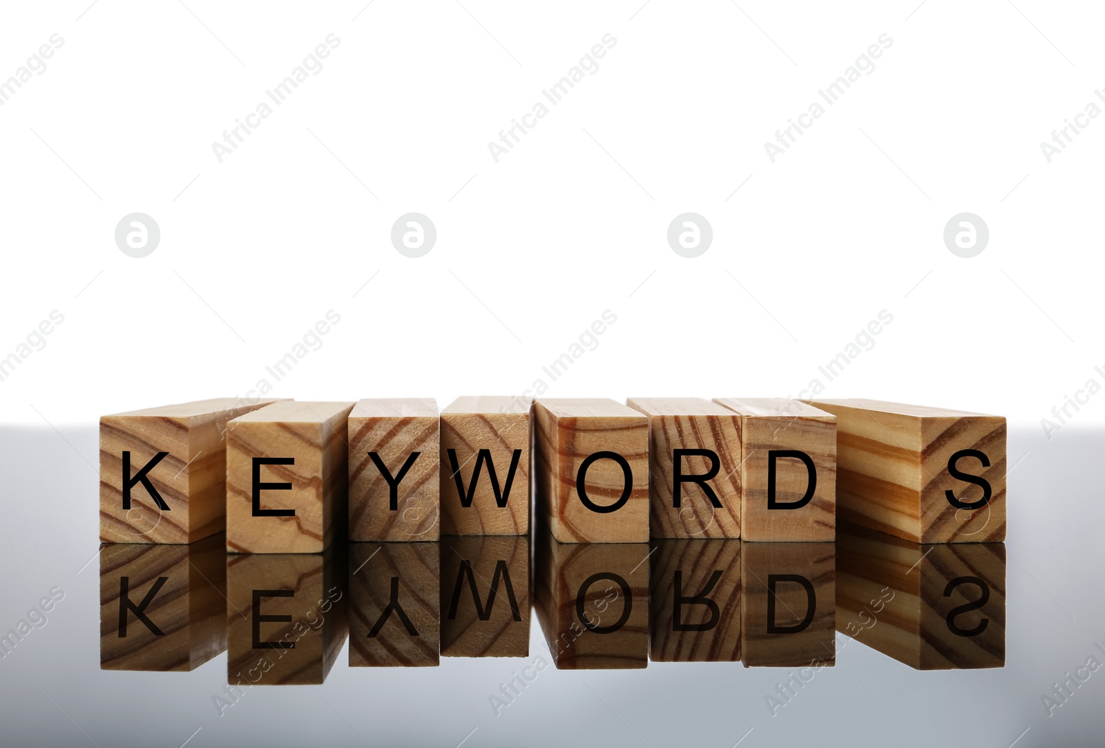 Photo of Blocks with word KEYWORDS on white background