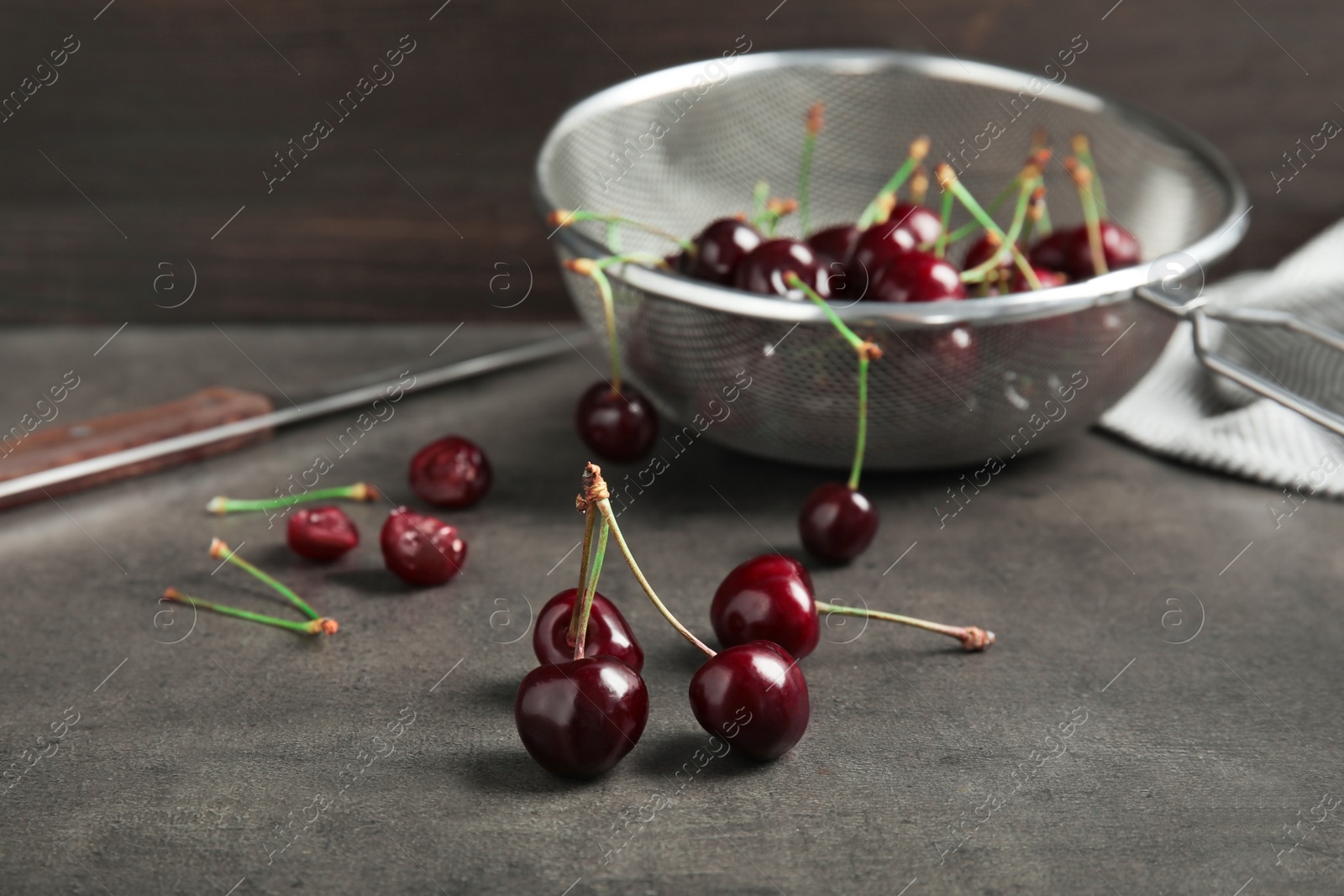 Photo of Sweet red cherries on table