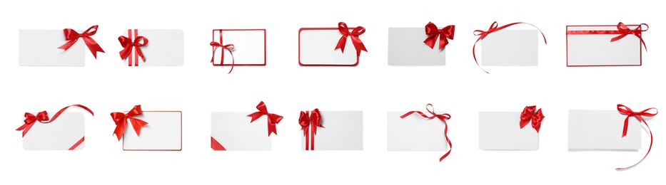 Set of many different gift cards with red bows on white background, top view