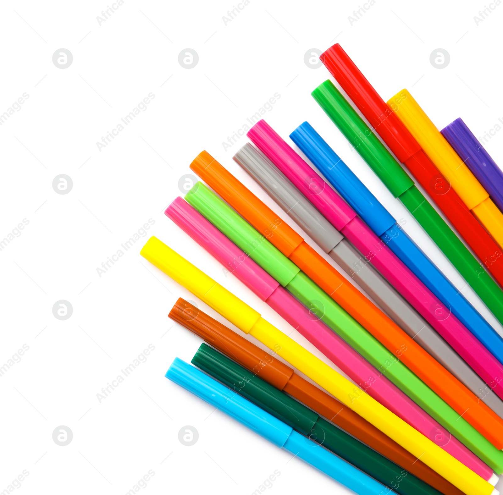 Photo of Many bright markers isolated on white, top view